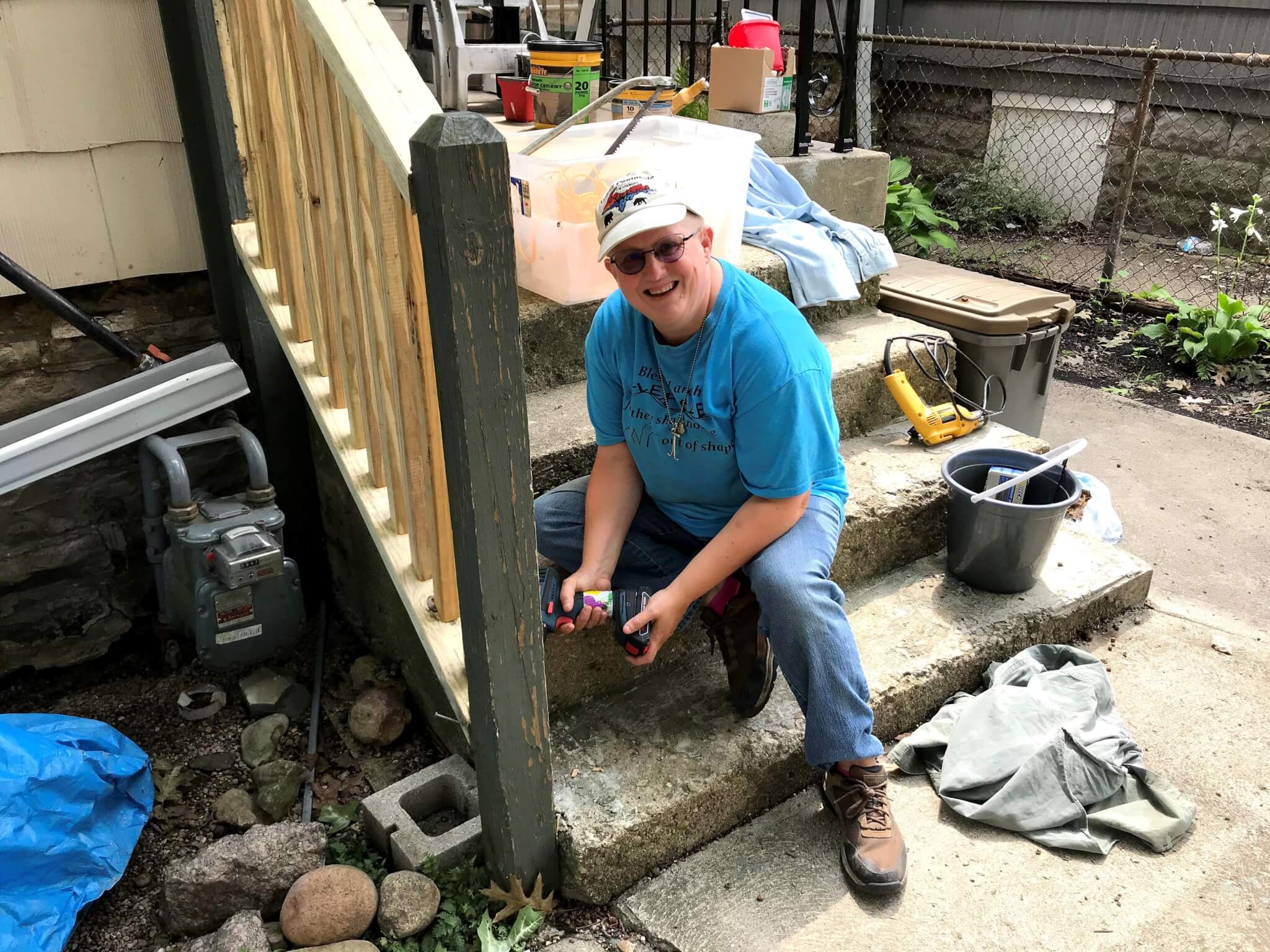 person repairing steps