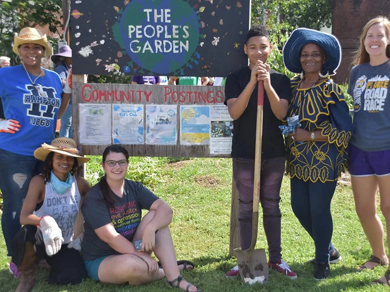 A group of Earthkeepers gather for a photo.