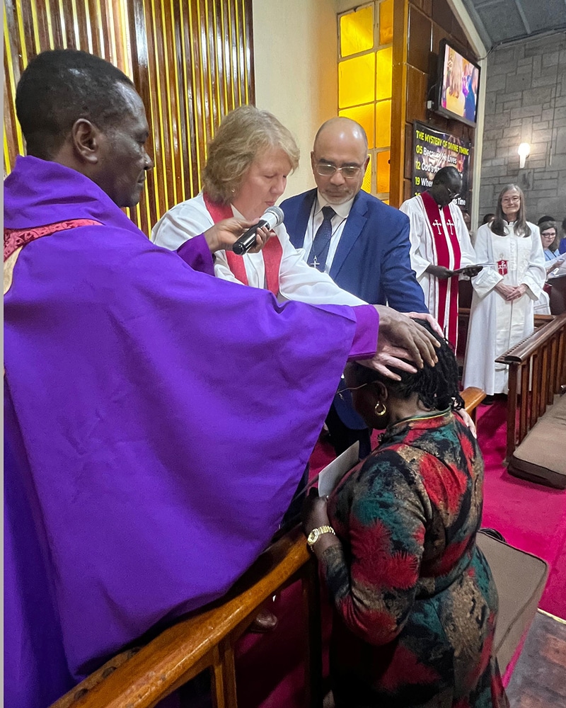Bishop John Maromba, Methodist Church in Kenya, Bishop Sue Haupert-Johnson, Richmond Episcopal Area, and Roland Fernandes, General Secretary, commission Florence Wandia for service in Nepal. Photo: Susan Clark