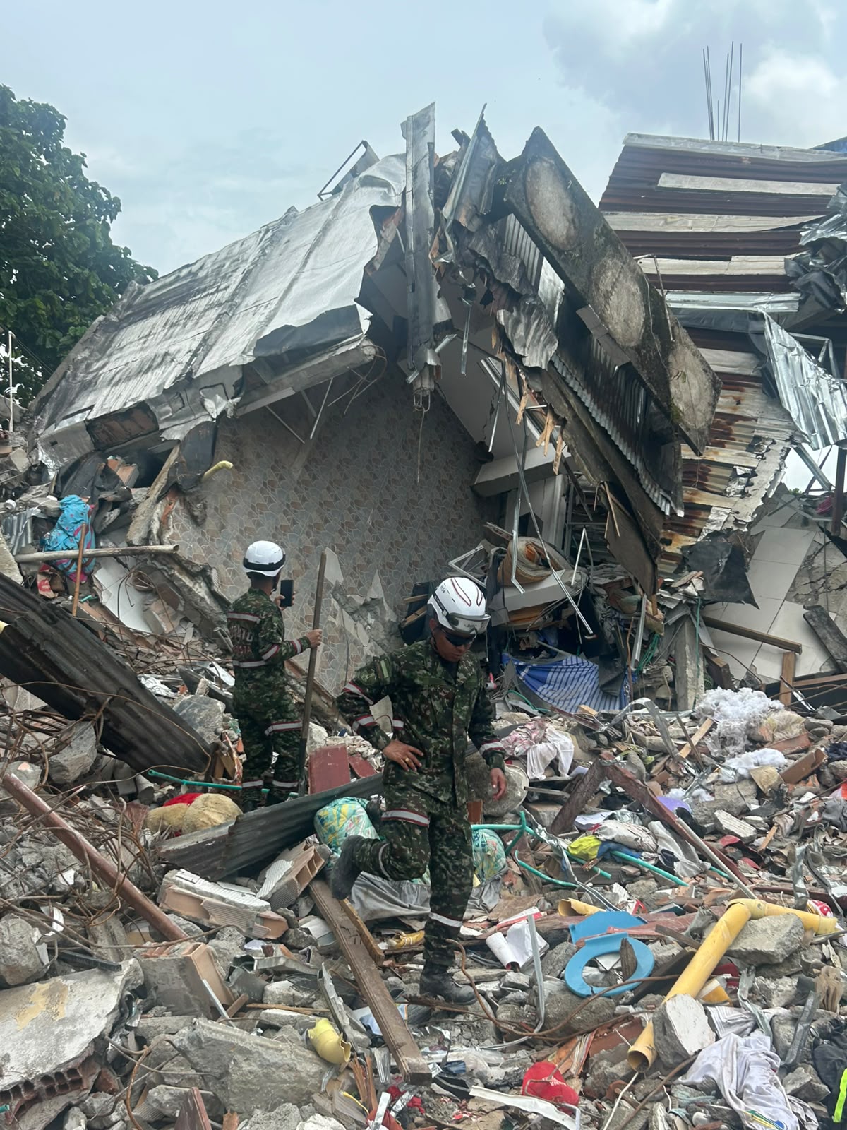 As of 12 August, official/OCHA figures reported more than 200 deaths and 2,500 injuries, with Cali and Pereira among the worst-affected areas, while casualties continue to rise as rescue operations proceed. Nearly 5,000 homes have been damaged and 387 destroyed, with 61 buildings collapsed, leaving tens of thousands displaced or sleeping outdoors amid continuing aftershock fears. More than 550 educational institutions and 24 health facilities have been affected, including the partial collapse of a major hospital in Cali and its paediatric ward, placing further strain on already stretched services. Infrastructure damage includes more than 350 community centres, roads and bridges, while localised power, water and telecommunications outages continue to isolate some communities.