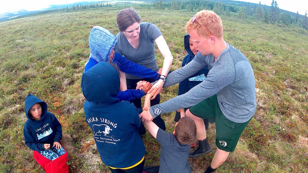 US-2 Alisha Rohrer is pictured serving with children and youth in Alaska in 2017-2019.